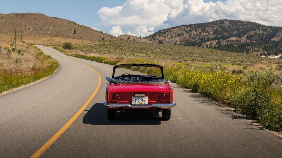 a red car on a road