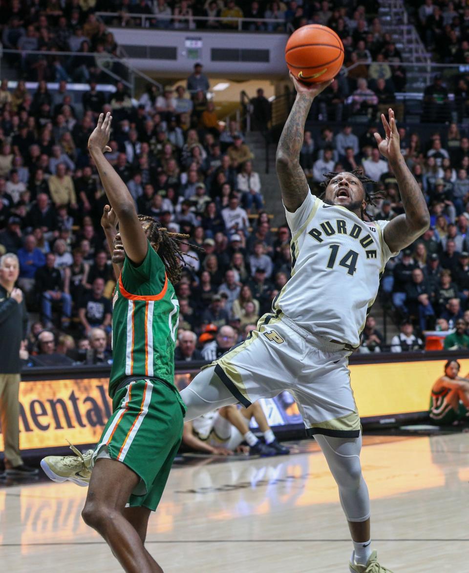 Purdue Boilermakers guard David Jenkins Jr. (14) attempts a shot during the NCAA men’s basketball game against the Florida A&M Rattlers, Thursday, Dec. 29, 2022, at Mackey Arena in West Lafayette, Ind. Purdue won 82 – 49.