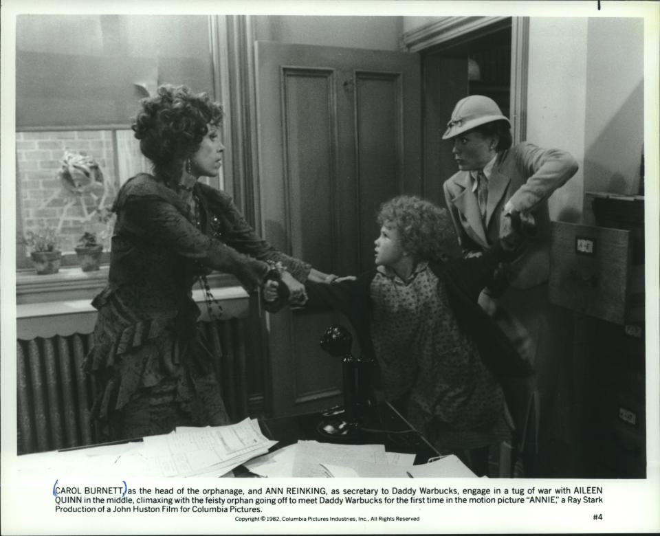 1982: Carol Burnett, left, and Ann Reinking tussle over Aileen Quinn in the movie "Annie."