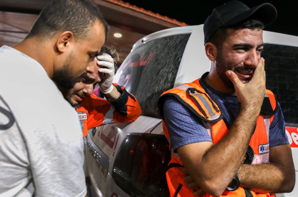 Palestinian paramedics were pictured crying outside Al-Shifa hospital on Monday (Dawood Nemer/AFP via Getty Images)