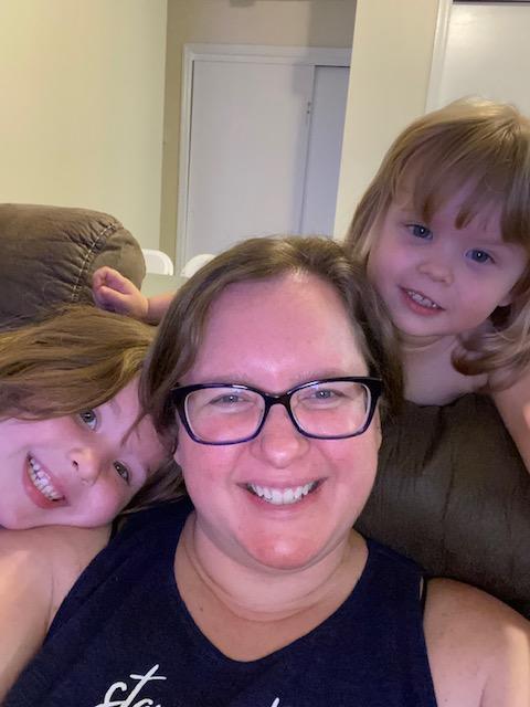 Judy Schmidt, pictured with her two children, hopes that sharing her psoriasis journey empowers and supports others with the skin condition. (Photo courtesy of Judy Schmidt)