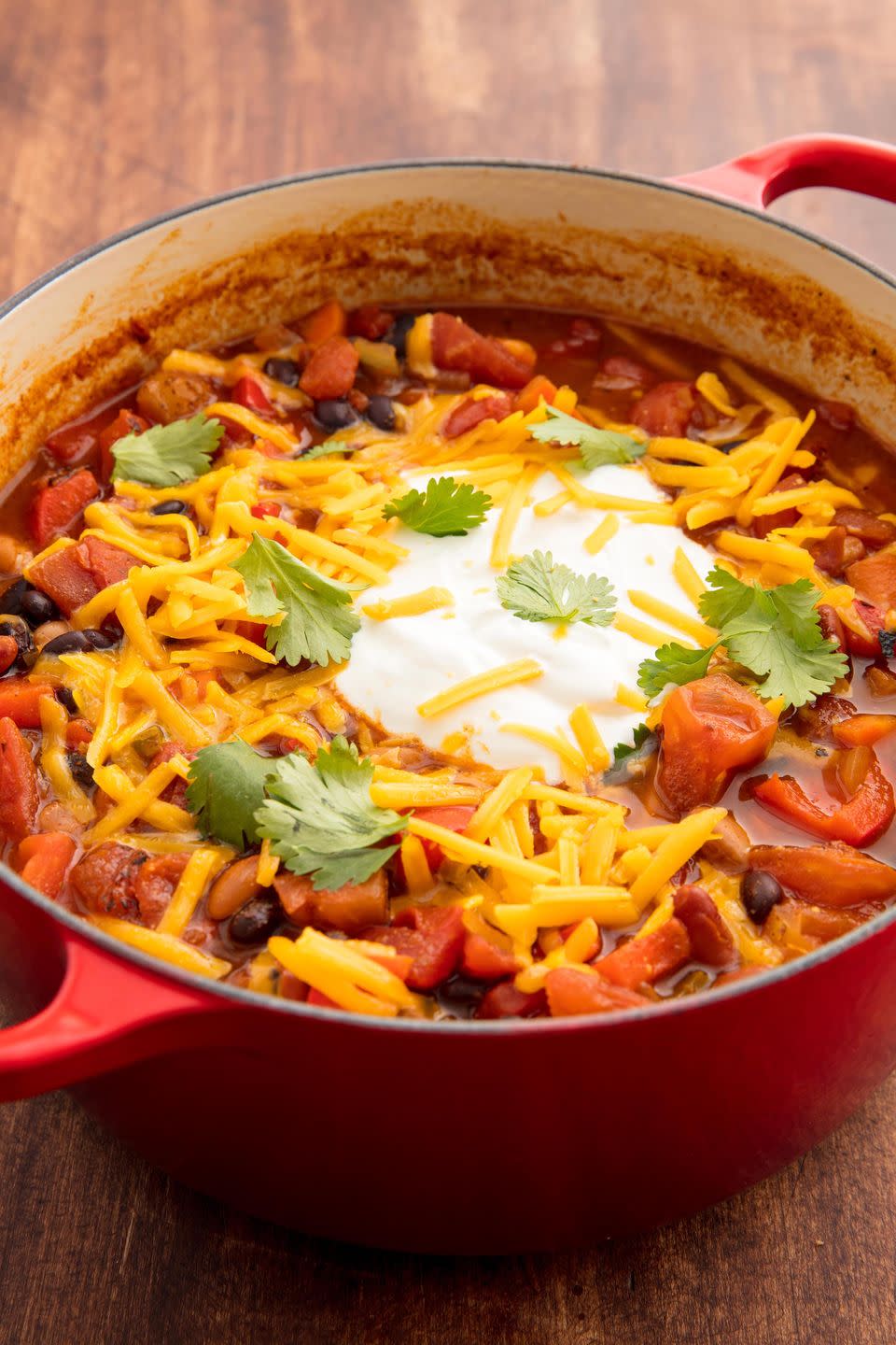 <p>Three beans = allll the protein.</p><p>Get the recipe from <a href="https://www.delish.com/cooking/recipe-ideas/recipes/a58719/easy-vegetarian-chili-recipe/" rel="nofollow noopener" target="_blank" data-ylk="slk:Delish;elm:context_link;itc:0;sec:content-canvas" class="link ">Delish</a>.</p>