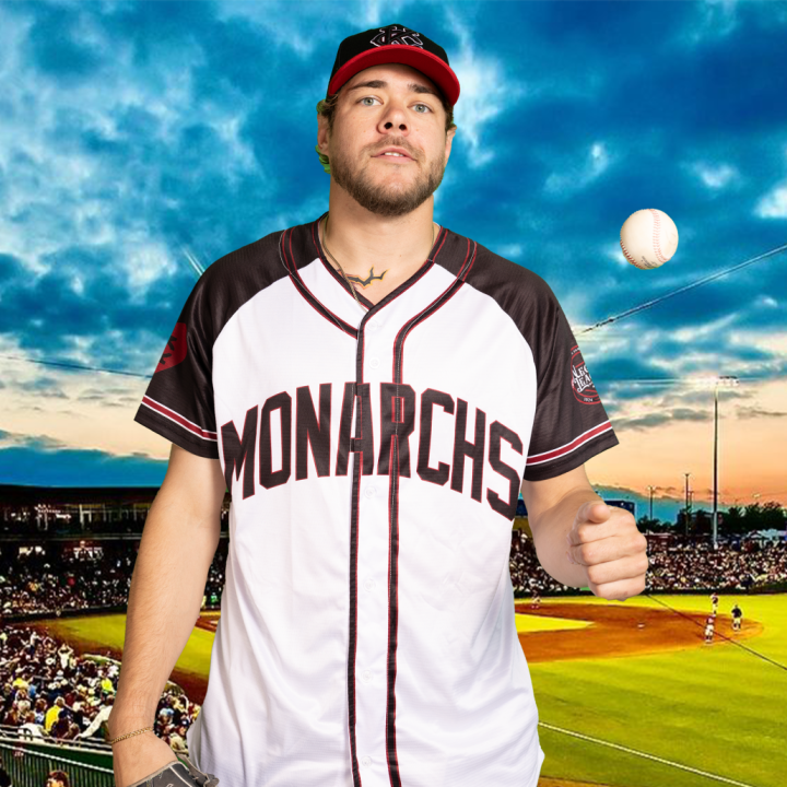 A photo of Dalton Moats showing the new home uniforms of the KC Monarchs for the 2024 season.
