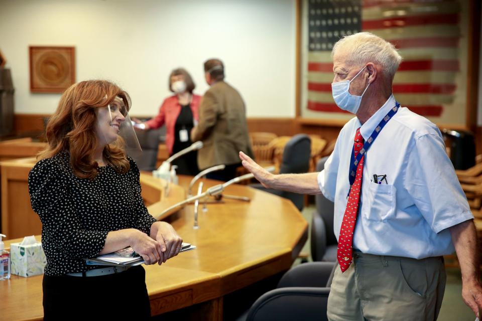 Rep. Christine Drazan, R-Canby, and Senate President Peter Courtney, D-Salem, talk after the Joint Committee on the First Special Session of 2020 took a brief recess at the Oregon State Capitol in Salem.
