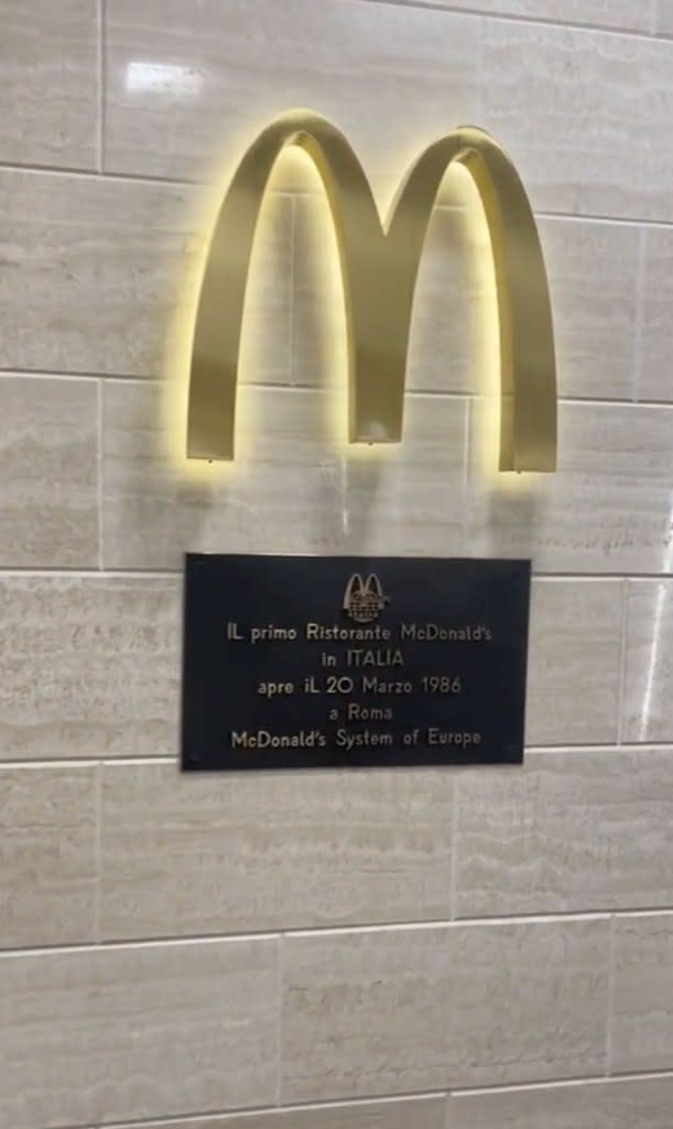 The place has a commemorative plaque for being the first McDonald's in Italy.  TikTok/@youramigoinitaly