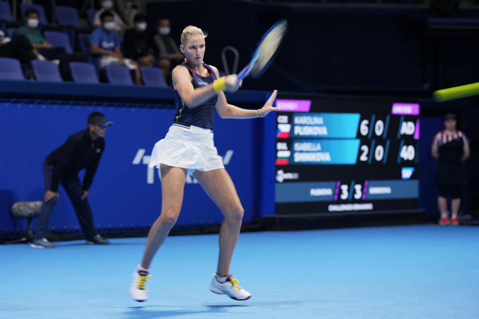 Karolina Pliskova of the Czech Republic returns a shot against Isabella Shinikova of Bulgaria during a singles match in the Pan Pacific Open tennis tournament in Tokyo, Tuesday, Sept. 20, 2022. (AP Photo/Hiro Komae)