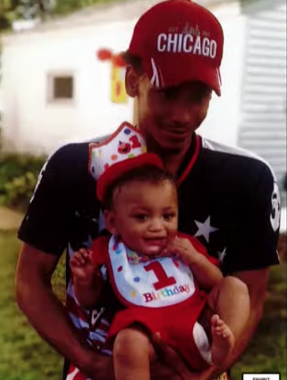 Daunte Wright with his young son in a photo shown to the jury (Hennepin County Court)