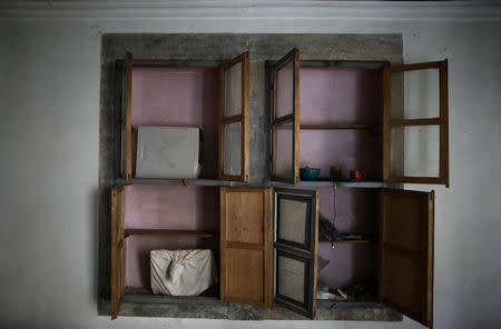 Empty cupboards are seen inside an abandoned house in western Mosul, Iraq, April 12, 2017. REUTERS/Andres Martinez Casares