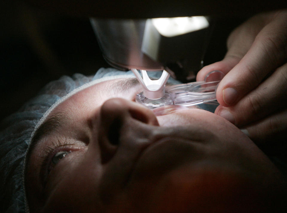 FILE - In this Nov. 1, 2005, file photo, Dr. Colman Kraff uses a laser during eye surgery at Kraff's offices in Chicago. The Nobels, with new winners announced starting Monday, Oct. 5, often concentrate on unheralded, methodical, basic science. Basic science even improves how we see with laser eye surgery and better lighting. (AP Photo/Charles Rex Arbogast, File)