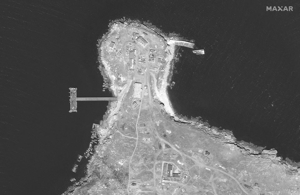 This WorldView-1 satellite black and white image from Maxar Technologies shows an overview of the northern end of Snake Island, in the Black Sea, on June 17, 2022. (Satellite image ©2022 Maxar Technologies via AP)