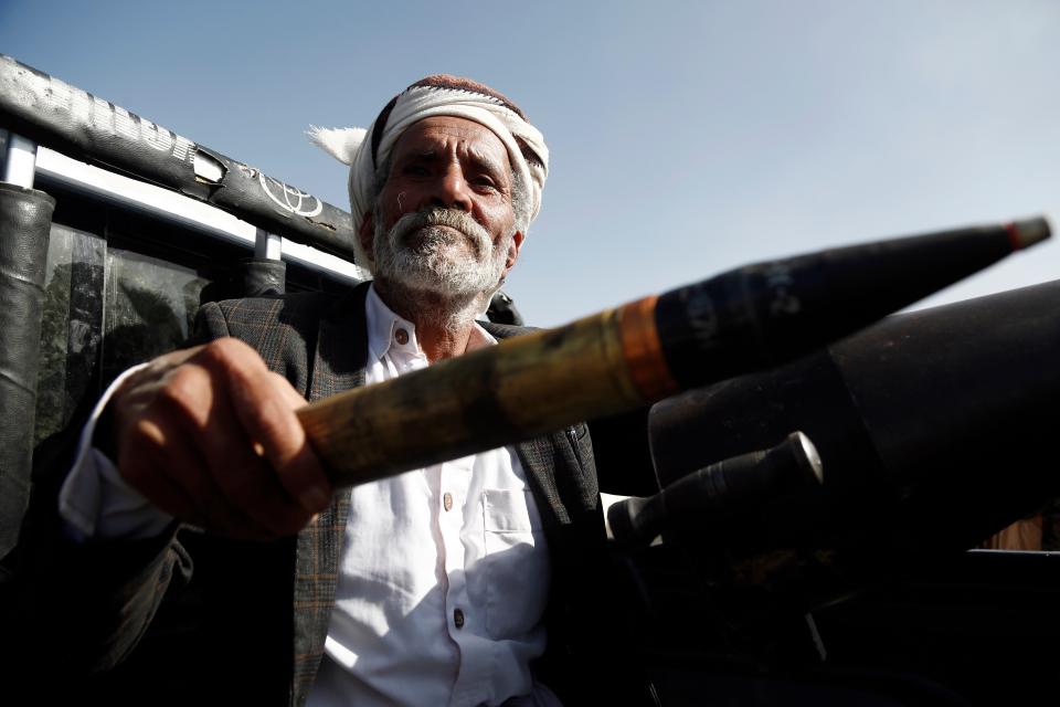 An elderly Houthi fighter mans a cannon mounted on a vehicle at a rally in support of Palestinians in the Gaza Strip (Getty Images)