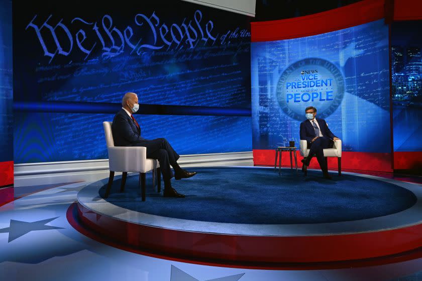 Democratic Presidential candidate and former US Vice President Joe Biden (L) and moderator George Stephanopoulos participate in an ABC News town hall event at the National Constitution Center in Philadelphia on October 15, 2020. (Photo by JIM WATSON / AFP) (Photo by JIM WATSON/AFP via Getty Images)