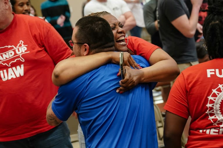 People celebrate after the United Auto Workers (UAW) received enough votes to form a union at a UAW vote watch party on April 19, 2024 in Chattanooga, Tennessee (Elijah Nouvelage)