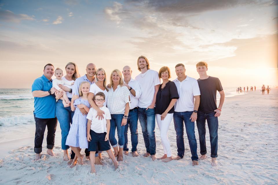 Doris Dunlap, center, with her husband, Doug, three children and grandchildren. Family and friends are organizing a “Laps for Dunlap” walking event at the Leon High School track at 9 a.m. Nov. 11, 2023, to benefit the ALS Florida Chapter.