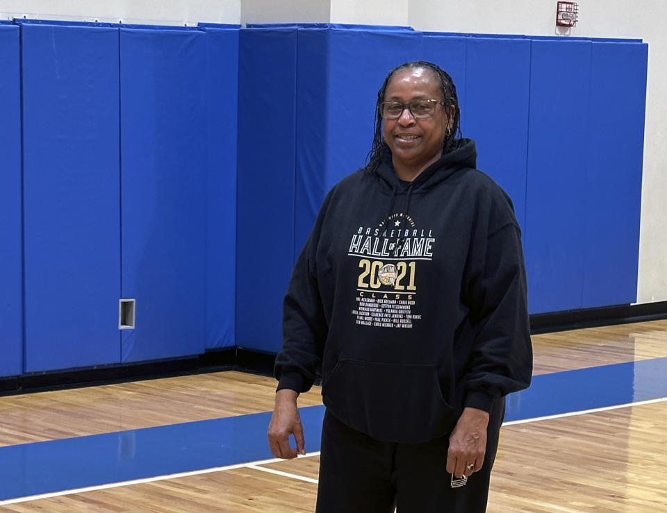 Pearl Moore poses at the Pearl Moore Basketball Center in Florence, S.C., Monday, Feb. 5, 2024. Long before Caitlin Clark made her first long-range three or signed her first autograph, Hall of Famer Pearl Moore had already set the scoring standard for women's basketball. Moore, 66, began her journey as the game's greatest female scorer in an era when women were not encouraged to play sports.(AP Photo/Pete Iacobelli)