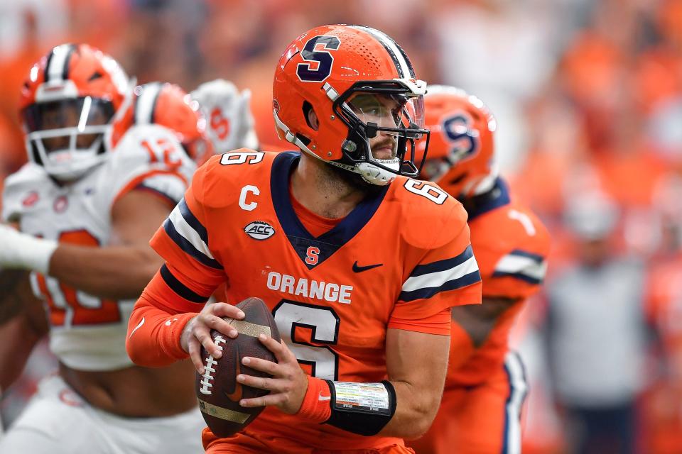 Syracuse quarterback Garrett Shrader (6) looks to pass during the first half of an NCAA college football game against Clemson in Syracuse, N.Y., Saturday, Sept. 30, 2023. (AP Photo/Adrian Kraus)