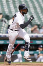 Detroit Tigers' Niko Goodrum breaks for first base with an RBI-single to give the Tigers a 3-2 lead over the Chicago White Sox during the seventh inning of a baseball game Tuesday, Sept. 21, 2021, in Detroit. The Tigers defeated the White Sox 5-3. (AP Photo/Duane Burleson)