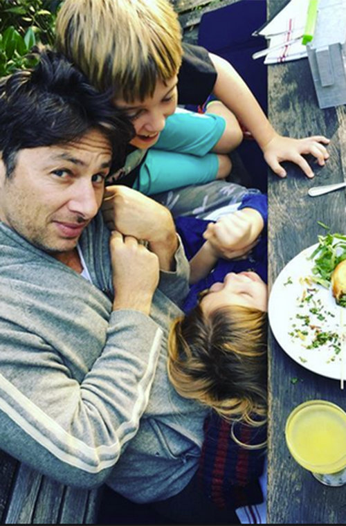 Zach Braff’s kiddo companions decided he was a play structure while enjoying a meal outside. At least it looks like everyone ate their vegetables before the monkey business broke out. (Photo: Instagram/zachbraff)