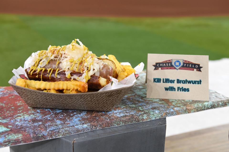 Kilt Lifter bratwurst with fries at Chase Field in Phoenix, Arizona.
