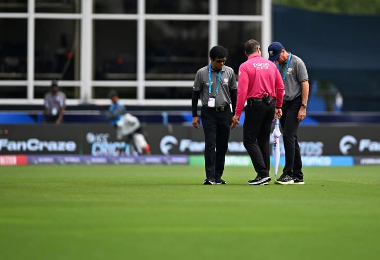 Match officials inspect the field before the T20 World Cup group A match between the USA and Ireland which was later abandoned (Chandan Khanna)