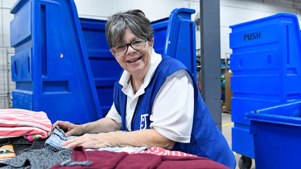 Sharon Pittenger of Palmetto, loves working at Goodwill. Pittenger, 68, went back to work to help with her monthly lots fees.