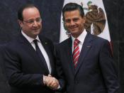 French President Francois Hollande, left, and Mexico's President Enrique Pena Nieto pose for photos during a signing ceremony at Los Pinos presidential residence in Mexico City, Thursday, April 10, 2014. Hollande is in Mexico for a two-day visit. (AP Photo/Marco Ugarte)