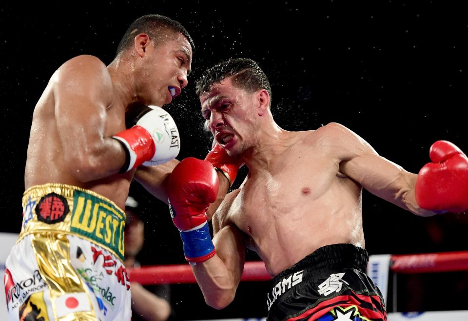 INGLEWOOD, CA - APRIL 23:  McWilliams Arroyo punches Roman Gonzalez losing in a unanimous 12 round decision during a WBC flyweight title fight at The Forum on April 23, 2016 in Inglewood, California.  (Photo by Harry How/Getty Images)