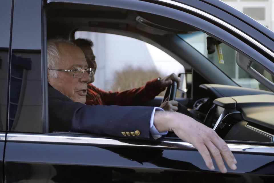 Democratic presidential candidate Sen. Bernie Sanders, I-Vt., departs Burlington International Airport after disembarking from a plane in South Burlington, Vt., on Saturday, Oct. 5, 2019. Sanders is back home in Vermont after being treated for a heart attack in Las Vegas. (AP Photo/Steven Senne)