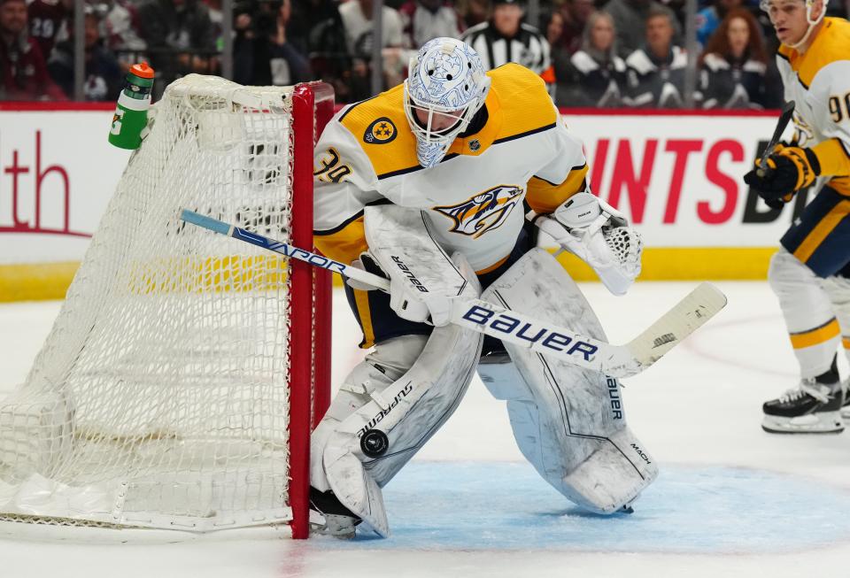 May 3, 2022; Denver, Colorado, USA; Nashville Predators goaltender Connor Ingram (39) makes a save in the second period of game one against the Colorado Avalanche of the first round of the 2022 Stanley Cup Playoffs at Ball Arena. Mandatory Credit: Ron Chenoy-USA TODAY Sports