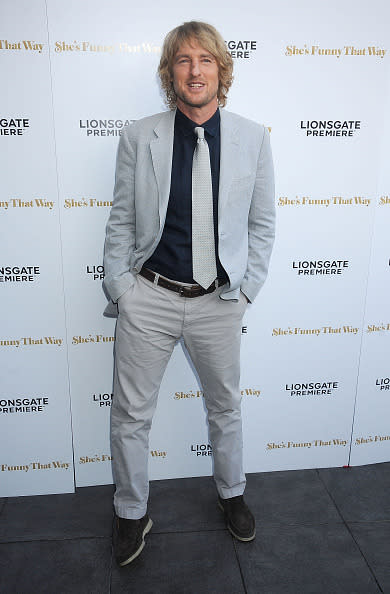 Owen Wilson in a gray blazer.