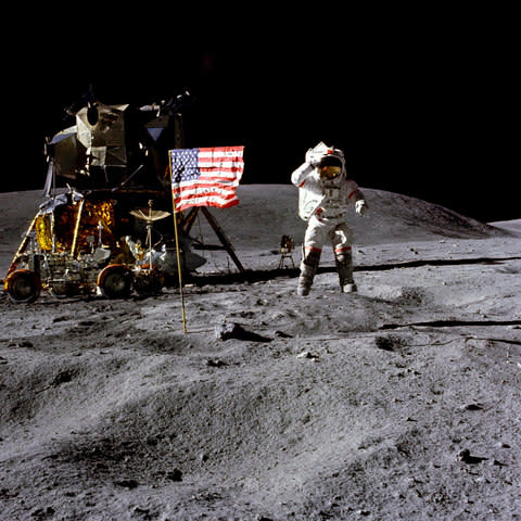 John Young salutes the US flag during his 1972 lunar mission - Credit: Nasa