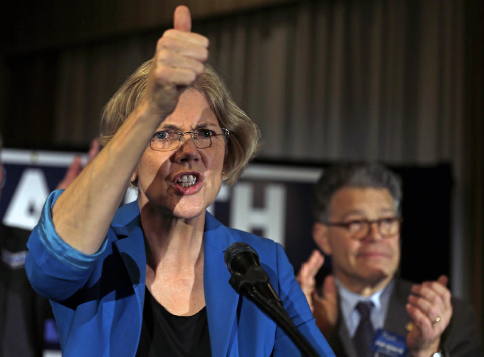 Massachusetts Democratic candidate for Senate Elizabeth Warren speaks during a campaign rally in Worcester, Mass., Friday, Oct. 19, 2012. At right is Sen. Al Franken, D-Minn. (AP Photo/Charles Krupa)