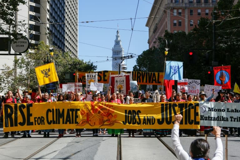 Crowds march in San Francisco during the "Rise For Climate" global action