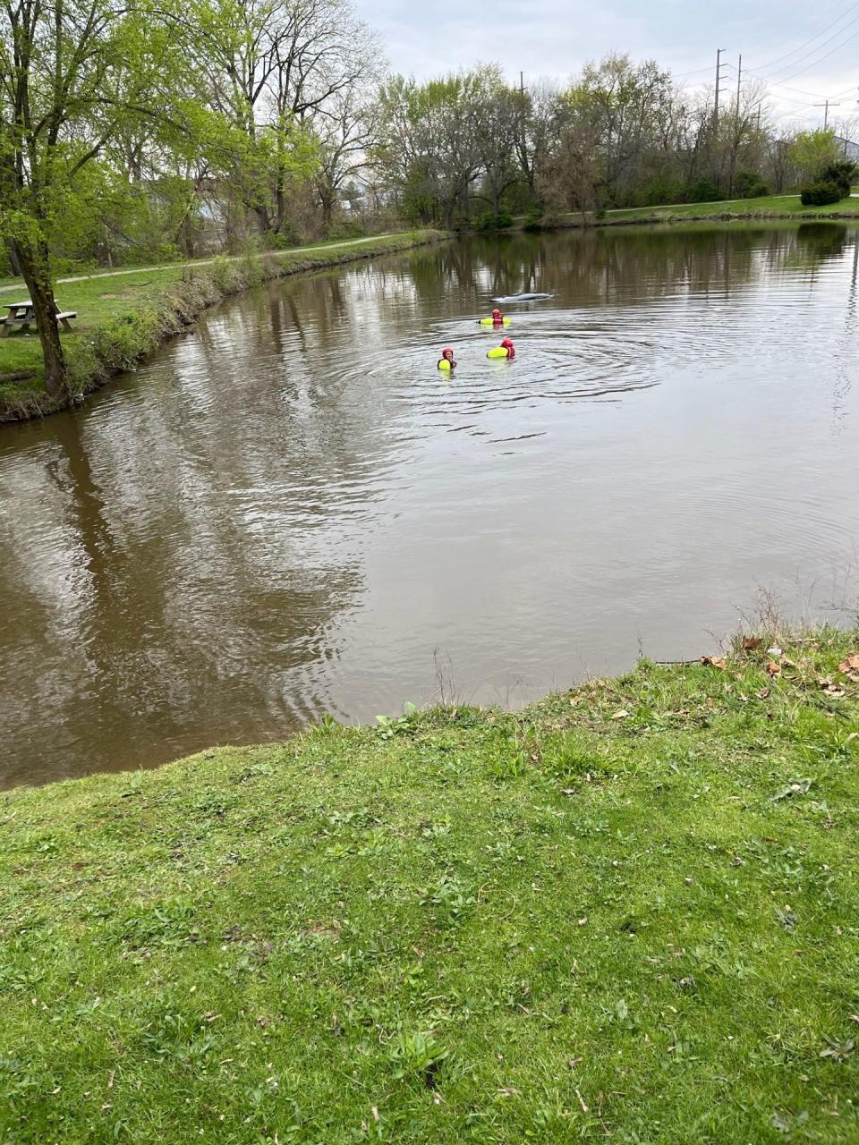 The Canton Fire Department water rescue team responded to Cook's Lagoon on Sunday morning to a report of an SUV submerged in the pond. There was no one in the vehicle, which had been reported stolen Saturday in Plain Township.