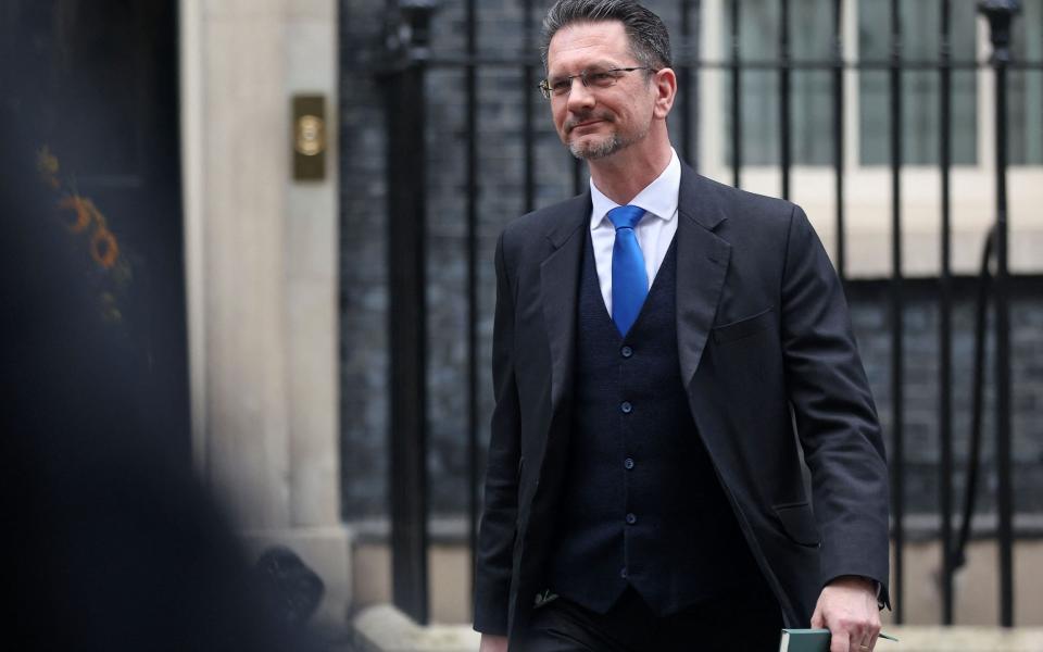 Steve Baker, a Northern Ireland minister, is pictured leaving 10 Downing Street today - Isabel Infantes/AFP 