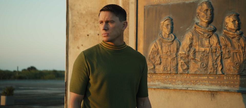 Channing Tatum in a green jumper in a scene from Fly Me to the Moon