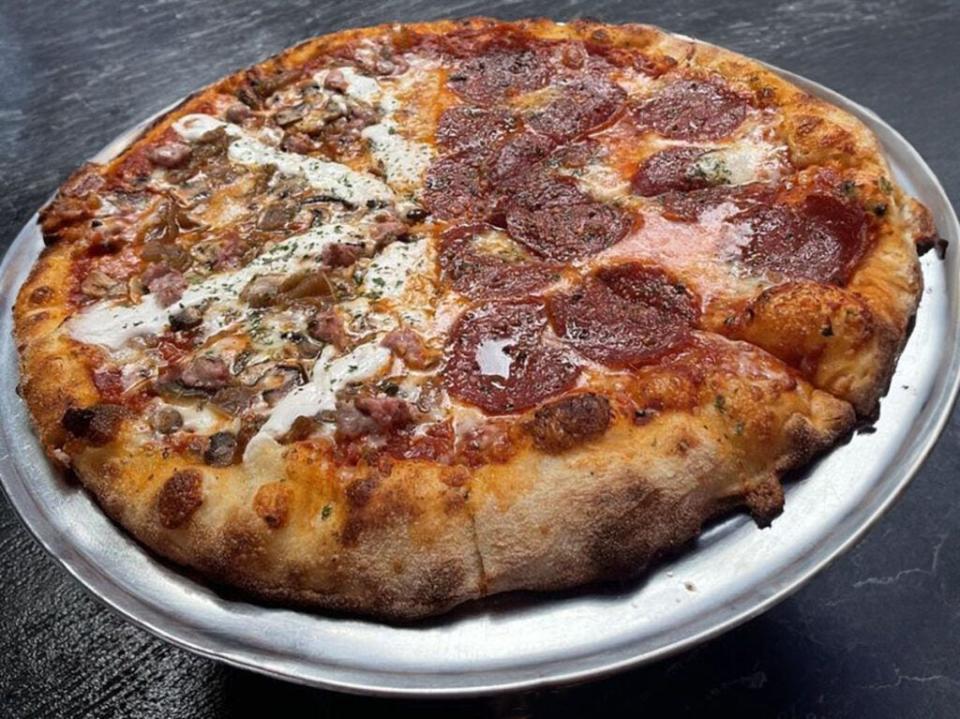 Restaurant: Union park pizza
Pictured: The Neighborhood with Sausage Pepperoni Pizza