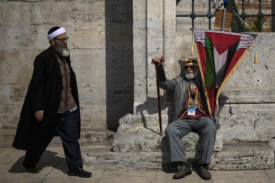 Supporters of Palestinians in Gaza protest in Istanbul, Turkey, Friday, April 5, 2024. (AP Photo/Khalil Hamra)