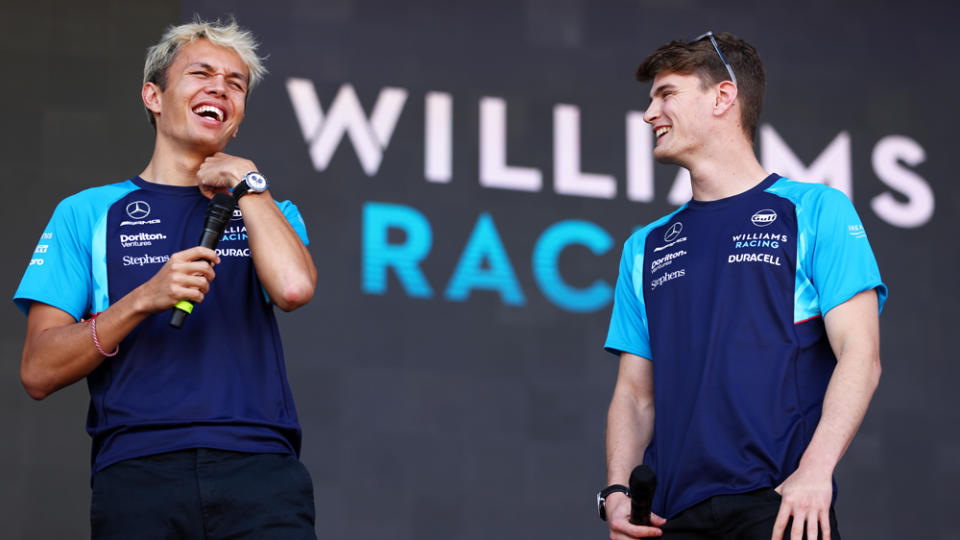 Alex Albon (left) and Logan Sargeant share a moment on stage before the 2023 Bahrain Grand Prix.