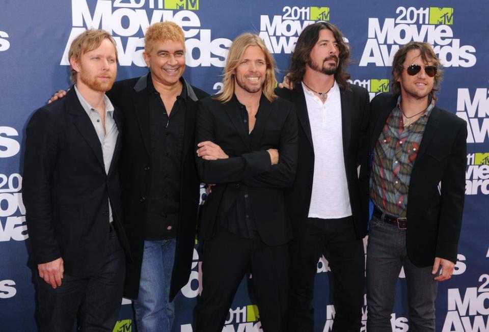 Taylor Hawkins with his Foo Fighters band mates (left to right) Nate Mendel, Pat Smear, Taylor Hawkins, Dave Grohl and Chris Shiflett (PA) (PA Wire)