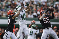 Cincinnati Bengals linebacker Logan Wilson (55) intercepts a pass to New York Jets' Braxton Berrios (10) during the first half of an NFL football game Sunday, Sept. 25, 2022, in East Rutherford, N.J. (AP Photo/Adam Hunger)