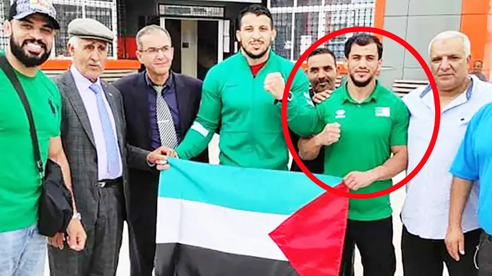 Fethi Nourine (second from right) is pictured here with members of Algeria's Olympic Games team.