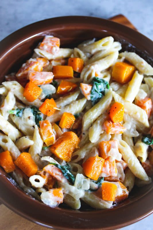 <p>Simply Scrumptious</p><p>Made with roasted butternut squash, and spinach, this homemade creamy sauce pairs perfectly with penne pasta.</p><p><strong>Get the recipe: <a href="https://simplyscrumptiouseats.com/creamy-roasted-butternut-squash-pasta/" rel="nofollow noopener" target="_blank" data-ylk="slk:Creamy Roasted Butternut Squash Pasta;elm:context_link;itc:0;sec:content-canvas" class="link ">Creamy Roasted Butternut Squash Pasta</a></strong></p>