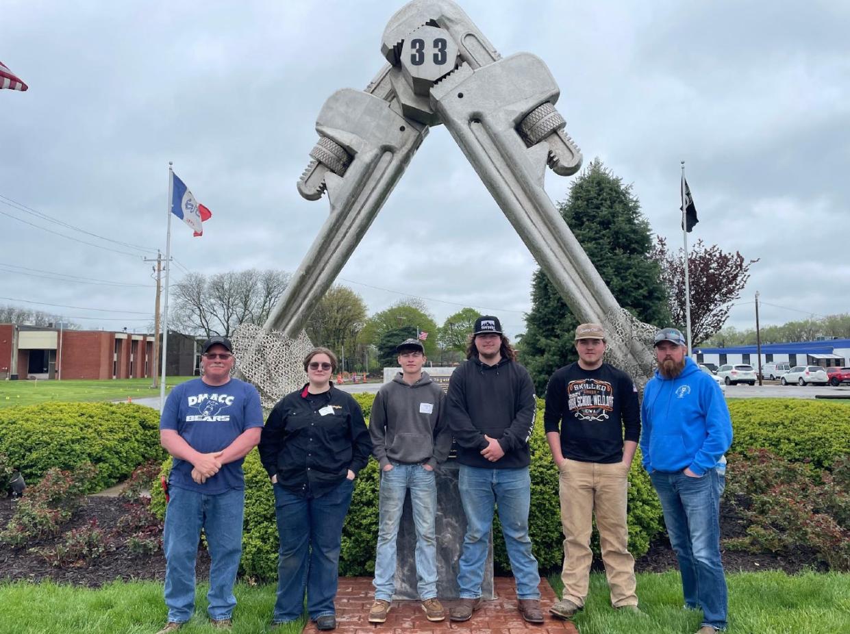 DMACC at Perry VanKirk Career Academy Welding Academy instructors and students pose for a photo at the Plumbers & Steamfitters Local 33 High School State Welding Contest on Friday, April 26, 2024, in Des Moines.