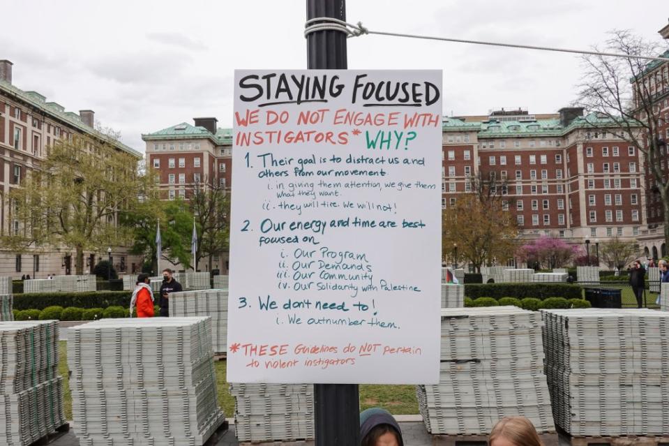 A placard at the tent city reminds activists about “staying focused.” LP Media