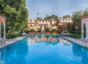 <body> <p>This Beverly Hills mansion played host to not one—but two—cinematic masterpieces: "The Godfather" and "The Bodyguard." Connoisseurs of film can re-trace the footsteps of the Corleone crime family or music sensation Rachel Marron in one of the home's 19 bedrooms and <a rel="nofollow noopener" href=" http://www.bobvila.com/slideshow/10-reasons-to-reconsider-the-aboveground-pool-47781#.WA50IJMrKRs?bv=yahoo" target="_blank" data-ylk="slk:two pools;elm:context_link;itc:0;sec:content-canvas" class="link ">two pools</a>. But the price you will pay for a piece of Hollywood history is steep: Its listing price is upwards of $175 million!</p> <p><strong>Related: <a rel="nofollow noopener" href=" http://www.bobvila.com/slideshow/swimming-with-the-stars-12-celebrities-cool-pools-2487#.WA5wYJMrKRs?bv=yahoo" target="_blank" data-ylk="slk:Swimming with the Stars: 12 Celebrities' Cool Pools;elm:context_link;itc:0;sec:content-canvas" class="link ">Swimming with the Stars: 12 Celebrities' Cool Pools</a> </strong> </p> </body>