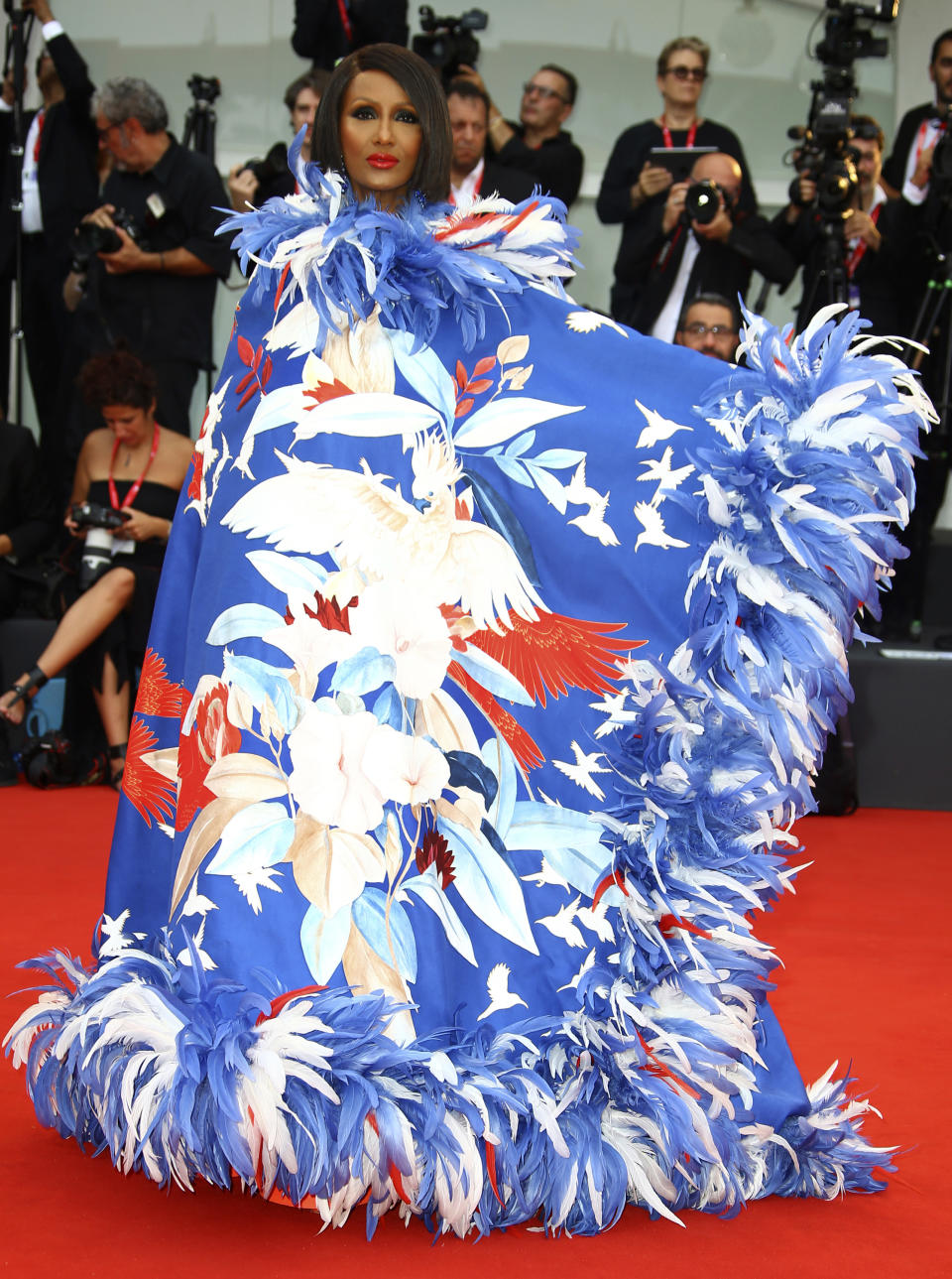 FILE - In this Aug. 28, 2019, file photo, model Iman arrives at the premiere of the film "The Truth" and the opening gala of the 76th edition of the Venice Film Festival, Venice, Italy. Iman turns 65 on July 25. (Photo by Joel C Ryan/Invision/AP, File)