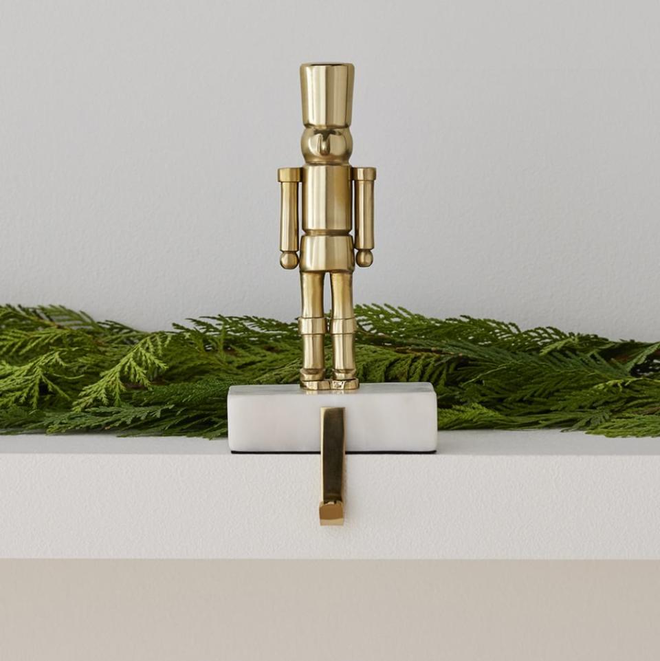 <p><a href="https://go.redirectingat.com?id=74968X1596630&url=https%3A%2F%2Fwww.westelm.com%2Fproducts%2Fbrass-marble-nutcracker-stocking-holder-d6624&sref=https%3A%2F%2Fwww.thepioneerwoman.com%2Fholidays-celebrations%2Fg37807770%2Fstocking-holders%2F" rel="nofollow noopener" target="_blank" data-ylk="slk:Shop Now;elm:context_link;itc:0;sec:content-canvas" class="link ">Shop Now</a></p><p>Brass & Marble Nutcracker Stocking Holder</p><p>westelm.com</p><p>$35.00</p><span class="copyright">West Elm</span>