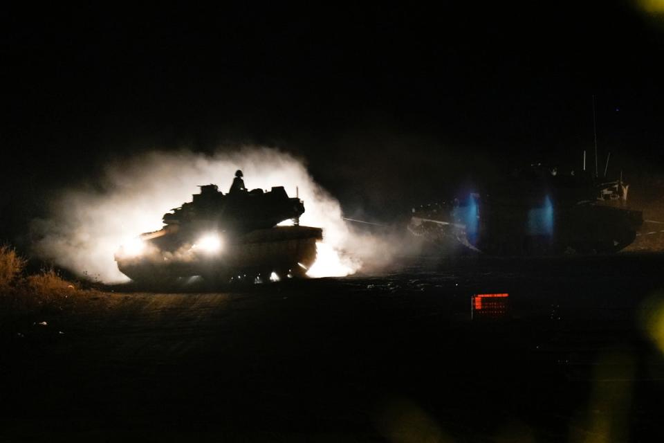 Israeli tanks were seen manoeuvring near the Israel-Lebanon border last night (Copyright 2024 The Associated Press. All rights reserved.)