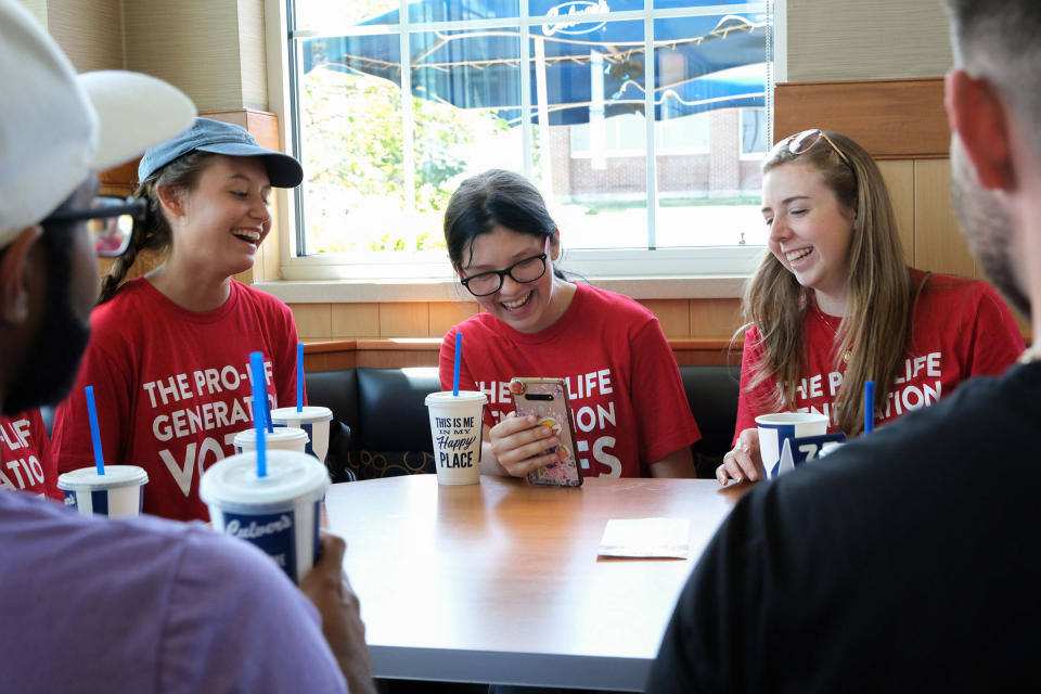 Students for Life of America volunteers take a break for lunch while canvassing in Johnson County on July 23.<span class="copyright">Arin Yoon for TIME</span>